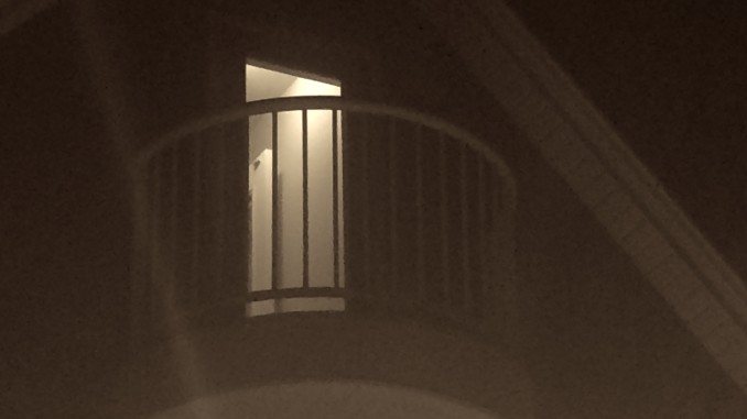 008 - Wife of deceased railroad employee appears on this balcony of the Suitor House