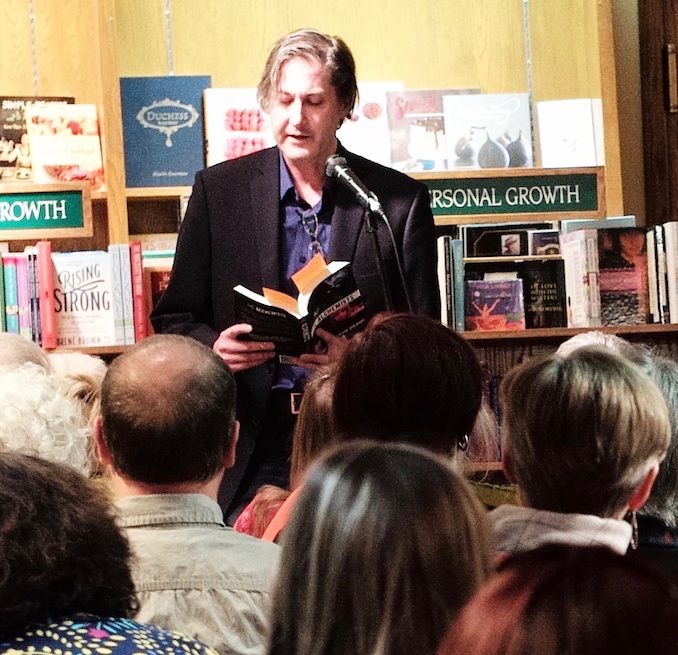 Craig DiLouie giving a reading at the Owl’s Nest bookstore in Calgary