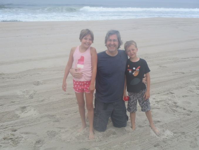 With his children at the beach in New Jersey, where he grew up. He takes his kids there every year to create magical memories of the ocean. Craig identifies as a dad more than anything else.