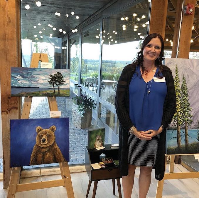 Heather Kinahan - Standing with my artwork at the Emerging Artists Showcase at Pinebrook Golf and Country Club – September 2019.