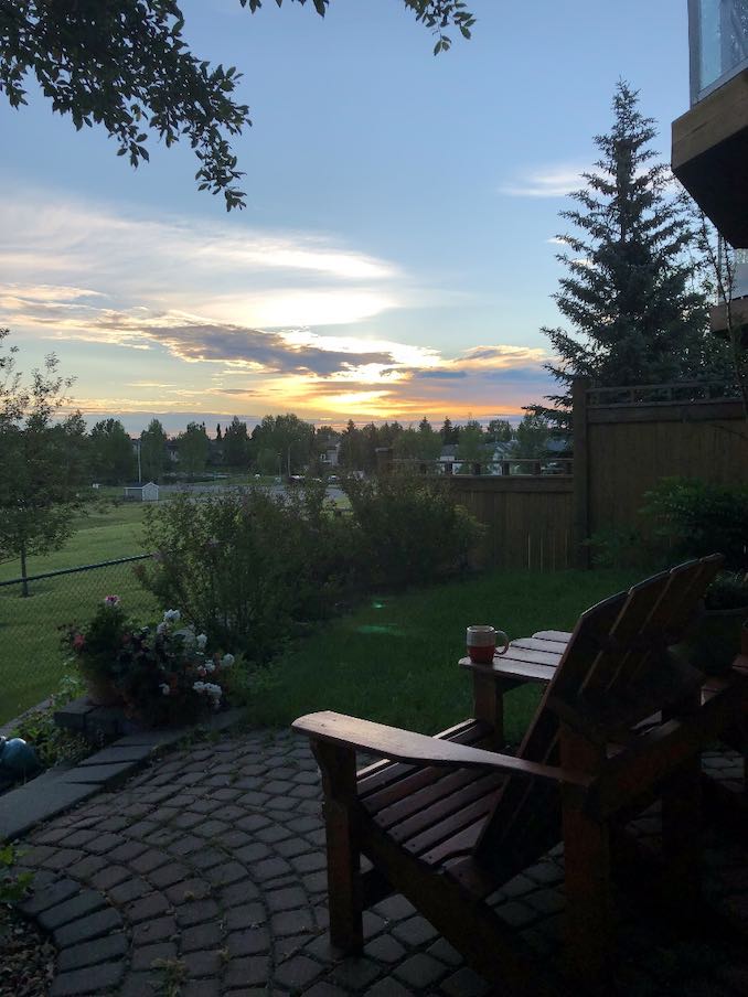 My favourite spot for morning coffee is this Adirondack chair in my own backyard. I can often be found reading here or quietly watching the everchanging Alberta sky.