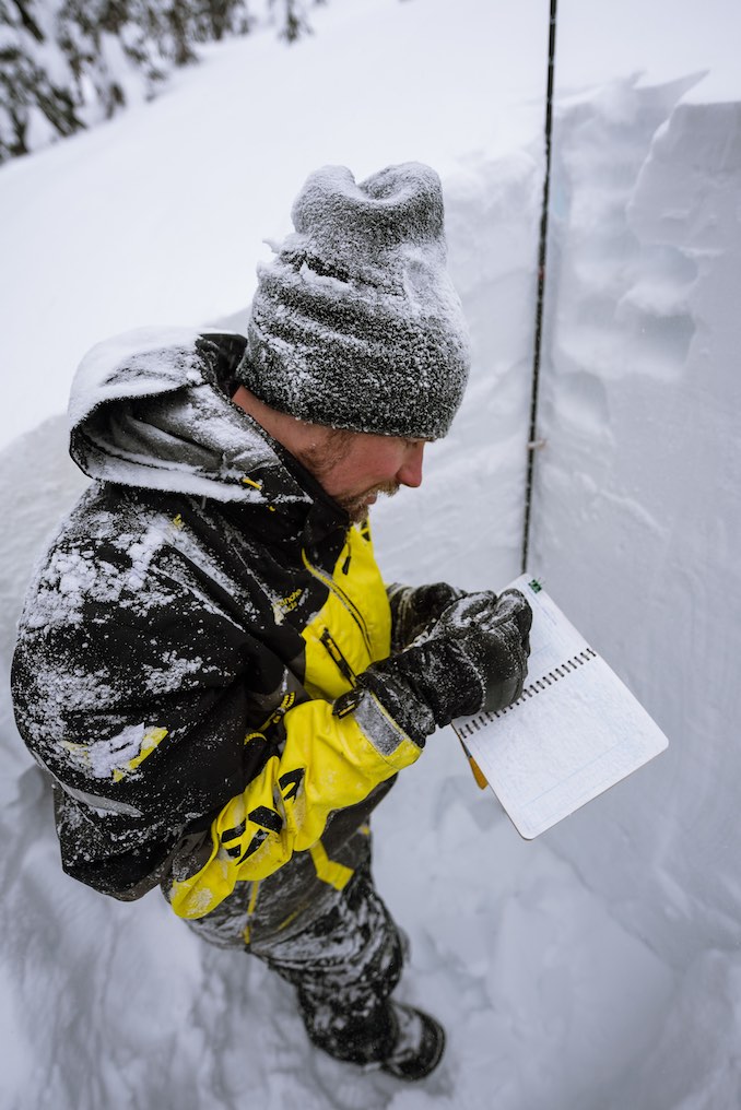 Field work involves digging snow profiles to get snowpack information.