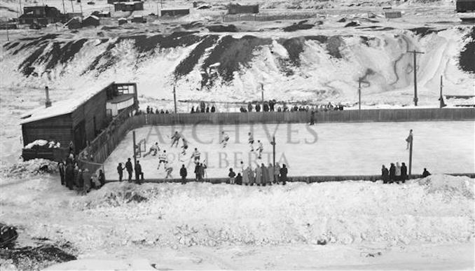 1920? - PR2009.0441.0074 - Hockey game on an open-air rink, Mountain Park, Alberta