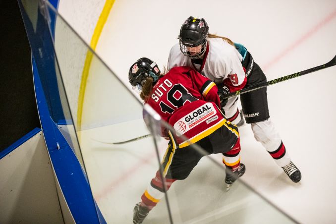 Hannah Suto, Calgary Fire Red and Emily Biggin, Airdrie Lightning in action during their game at Ed Whalen Arena, Calgary on March 3, 2019. © J. Ashley Nixon