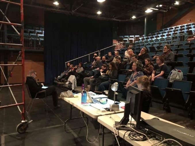 Andrew Cooper giving notes to the cast and crew after a dress rehearsal at Morpheus Theatre.