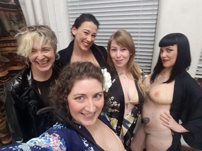 This is a picture of my Naked Girls Reading entourage led by Keely Kamikaze  (they're not really naked, btw, they're wearing tata tops for the picture)  when I was asked to perform