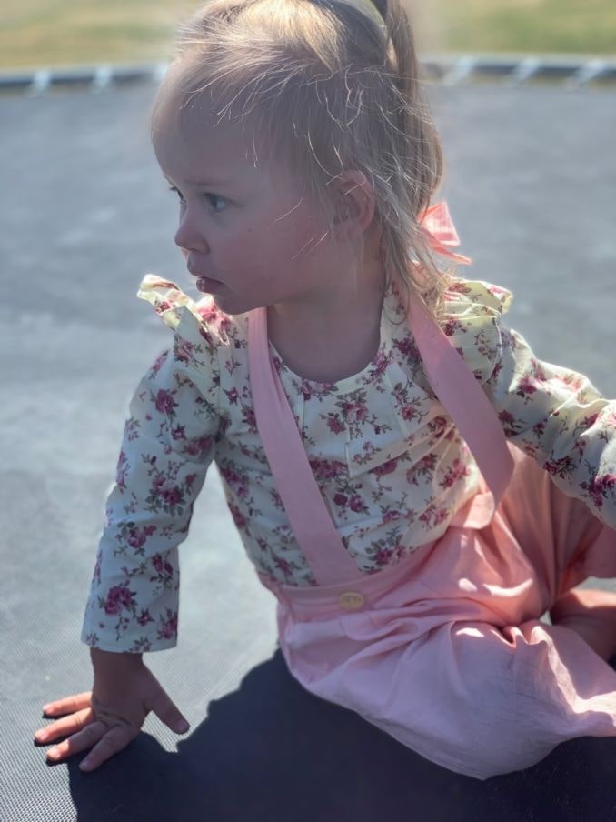 Chantel’s daughter Harper Lee Rollison (2, 2020) playing on a trampoline.-min