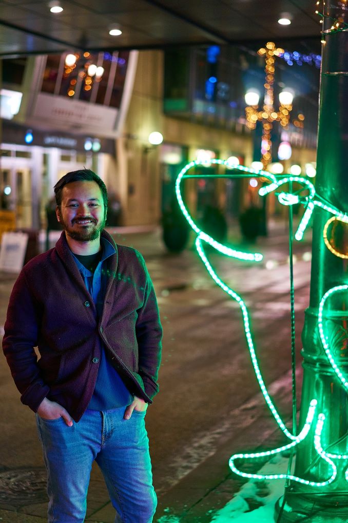  I had to have a nice photo of myself taken for another project, so naturally, I opted to have my photo taken in front of the neon frog from the Zoolights sign on Stephen Avenue. Where else would you go? (Photo credit to Steven Medeiros).