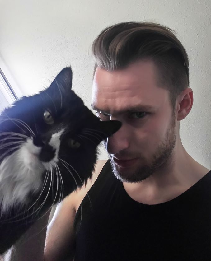 Starting a gang with his friend’s cat, Kiki.