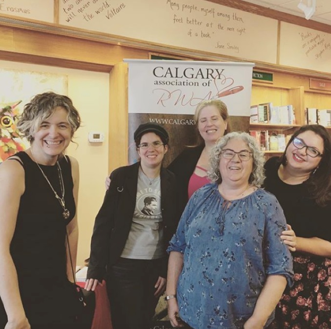 The author with fellow romance authors (LtoR) M Jane Colette, Jilly Jax, Win Day and Emma Vance at the first annual Bookstore Romance Day in August 2019 at Owl’s Nest Books in Calgary. (photo by M Jane Colette)