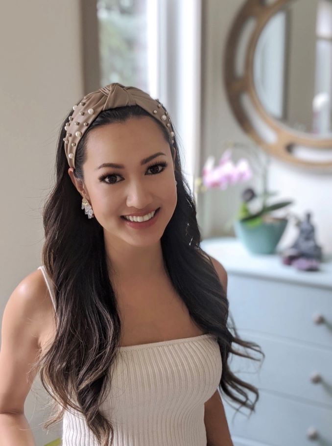 JaiHo Accesories Owner, Jenny Ho, shown wearing the Aimee headband in nude, and the Aria freshwater pearl cluster earrings