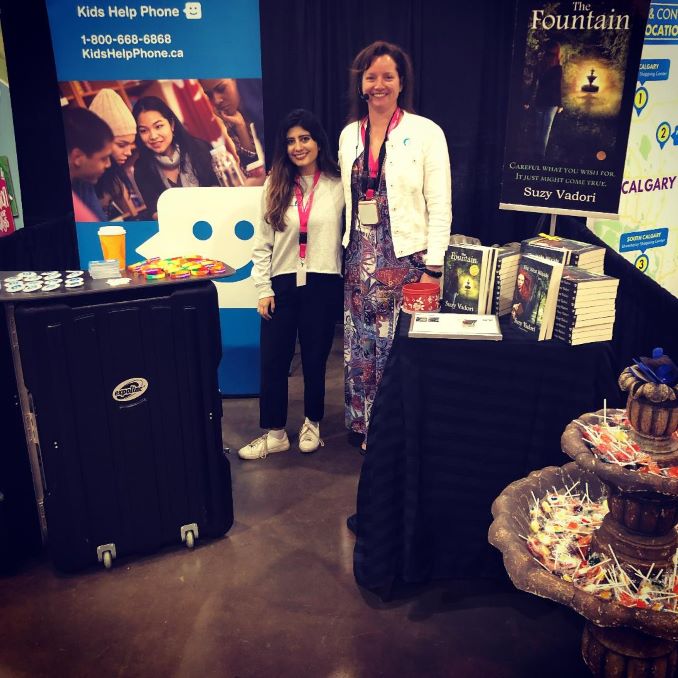 Suzy supports Kids Help Phone, and donates a portion of her book sales to them each year. This is Suzy and Kids Help Phone Development Coordinator Carolina Bejarano making a joint appearance at Calgary’s This Girl Can Girl’s Expo. Kids Help Phone provides a safe and trusted place for young people in any moment of crisis or need. 