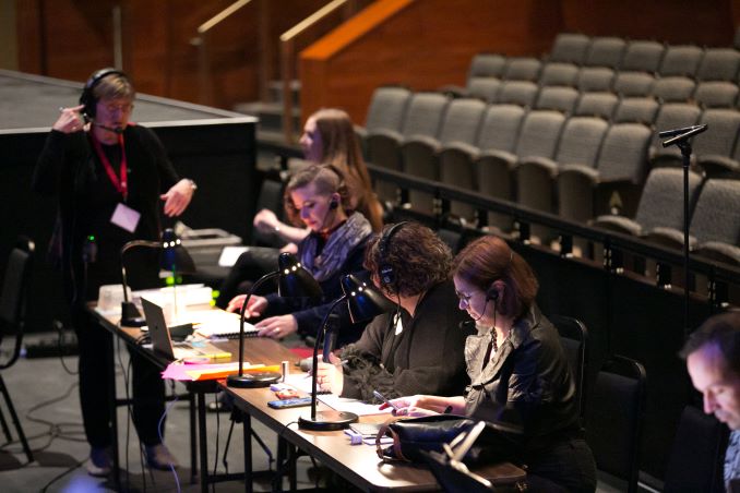 Alida Howe When we perform at the Jubilee, I'm a part of the production team that makes sure all the details come together: performers, lights, sound, costumes, props, sets. There are a lot of moving pieces, and this team, shown here during our 2019 Christmas dress rehearsal, keeps track of all of them.