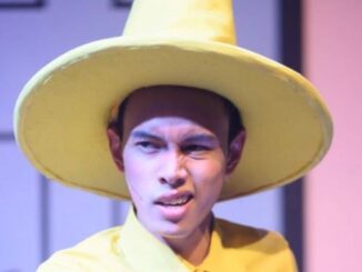 EJ as The Man in the Yellow Hat in Storybook Theatre’s production of Curious George COLON The Golden Meatball in 2019. Photo by Benjamin Laird.
