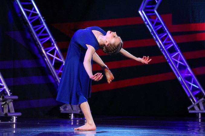 I have always had a special place in my heart for the stage and the joy of performing. I compete regionally as well as nationally, travelling to compete with my team in both solo and group routines. Getting to share my art on stage excites me and motivates me in my year round training. This is a solo I’m currently competing, choreographed by Stacey Tookey.