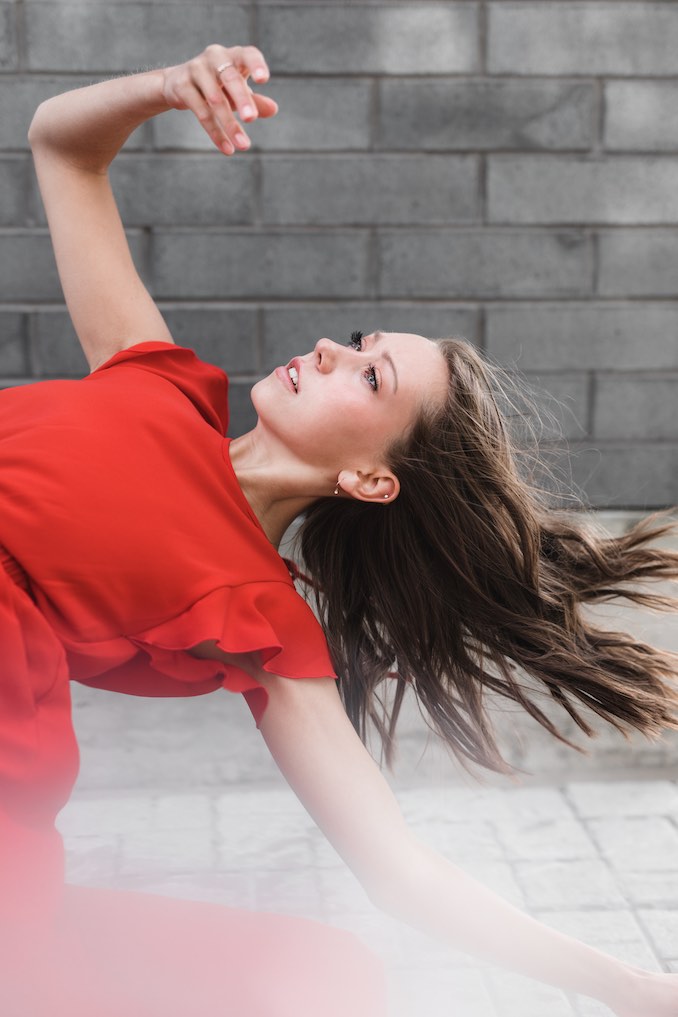 This shot was taken from a movement shoot in Calgary’s vibrant East Village, with photographer Jenna Maslechko. Capturing the true essence of dance on film involves a collaborative process through which the artistry of the dancer can be expressed. I love getting to experience location, lighting, and colours all come together to form Art. 