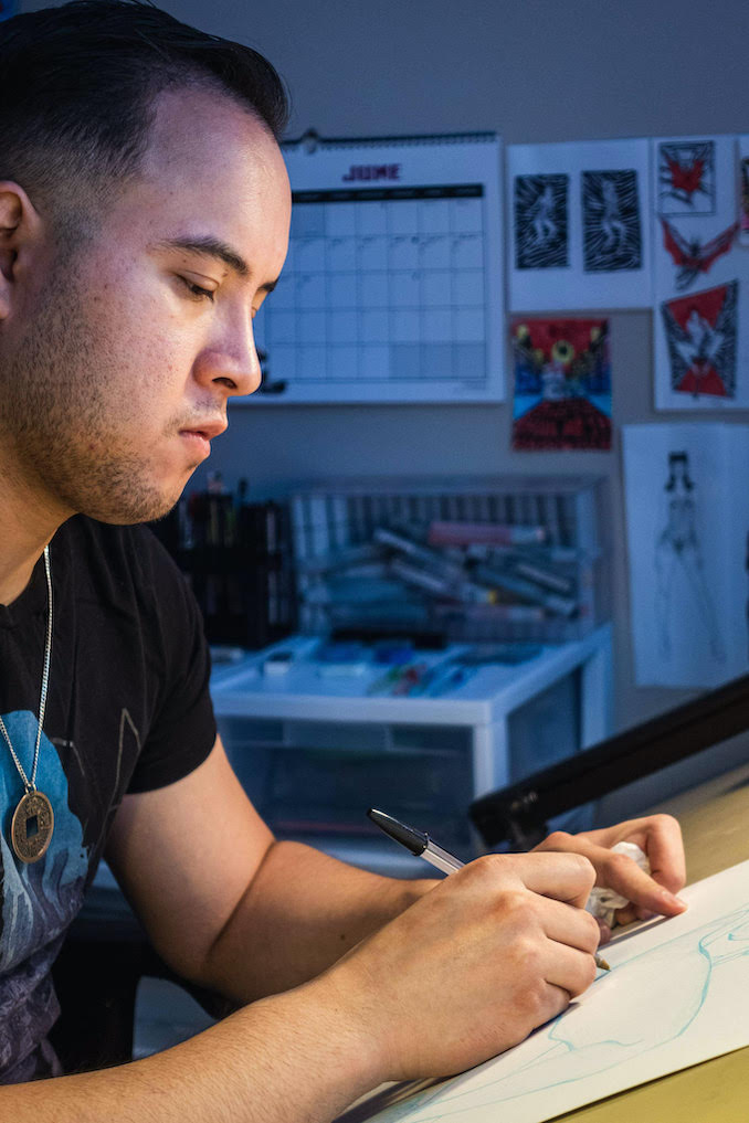 Benjamin Wei Yi Mark - Ben starting the first few layers of crosshatching with a Bic ballpoint pen at his drafting table in the studio.