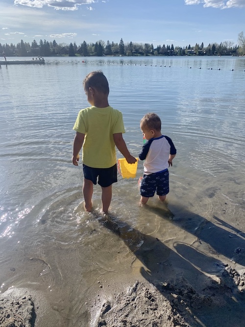 These two boys, my husband and our dog Presley are the hot fudge to my sundae, the sprinkles to my donut, the cookies to my milk, the cheese to my pizza… you get the idea. Here’s a photo of our boys at Lake Bonavista.