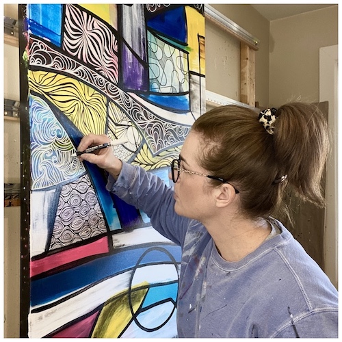 Mary-Jo Lough - I am a messy painter, and as such I have painting clothes! This picture shows me working in my studio on a piece that has since changed quite drastically that will be part of the Divergent collection.