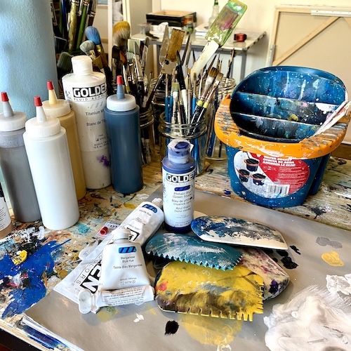 Mary-Jo Lough - These are a few of my favorites! I love catalyst wedge tools, I probably use them in every single piece I create. Blue is my favorite colour – especially phthalo blue green shade. I am a very organized messy painter, although everything has paint on it, everything has a “home” in my studio.