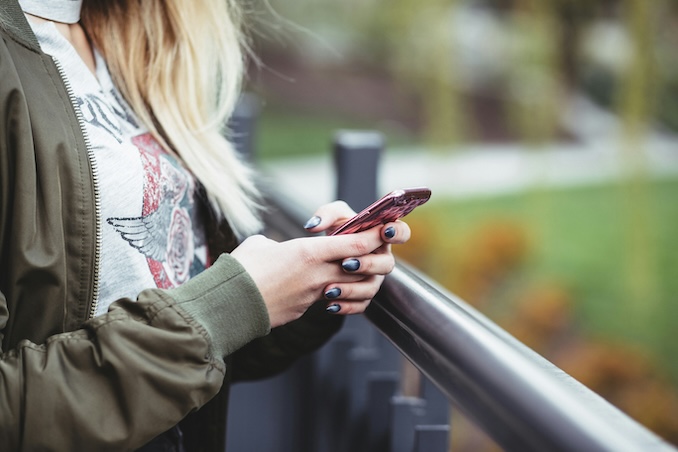 Woman using her cell phone