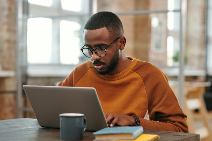 Man using laptop in office